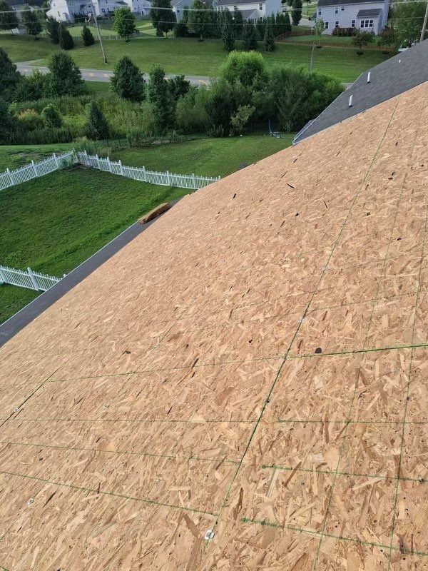 The clean OSB deck running down to the roof edge, Xenia, Ohio.