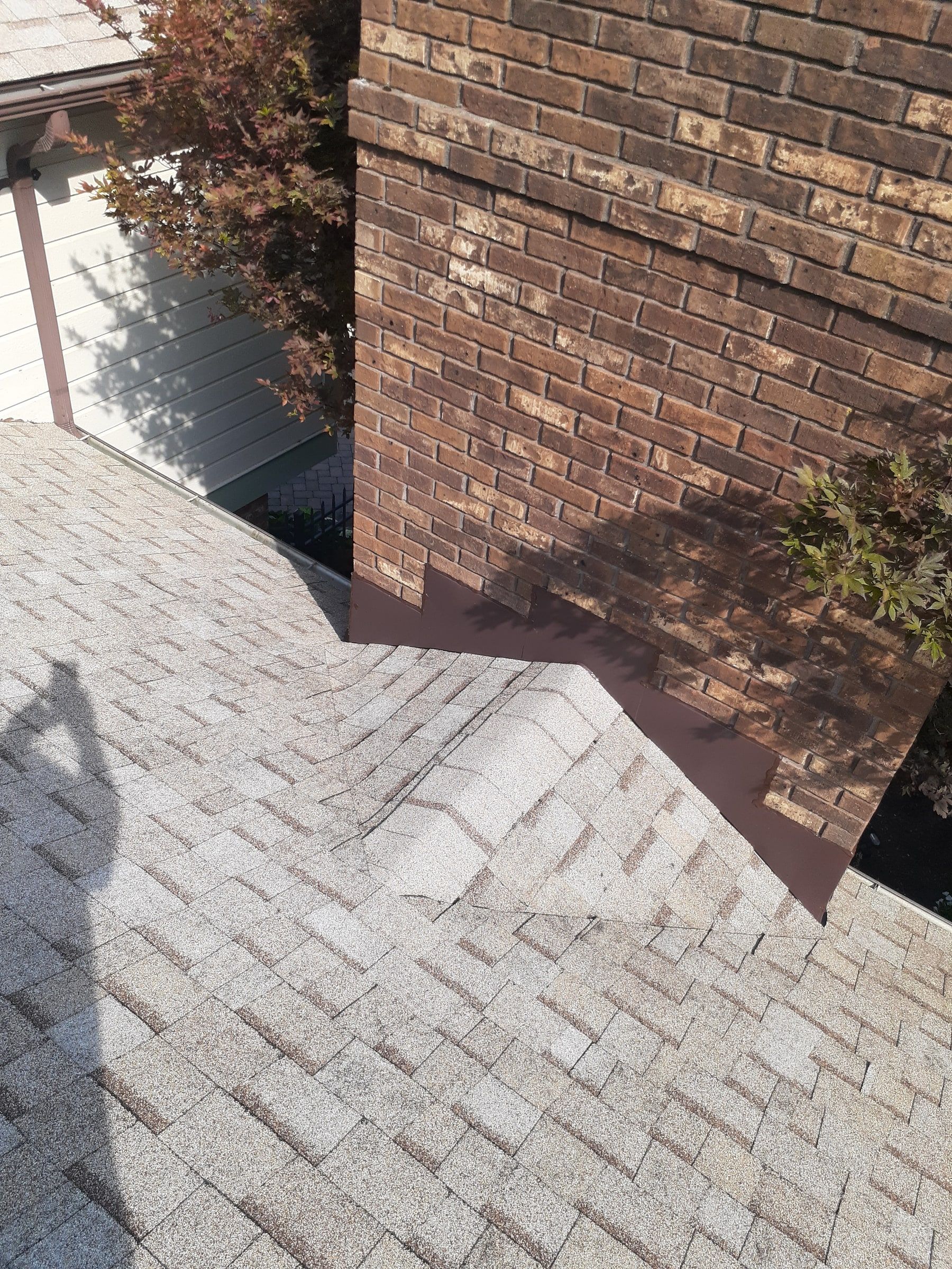 Finished chimney flashing and shingles from the upper slope, Jamestown, Ohio.