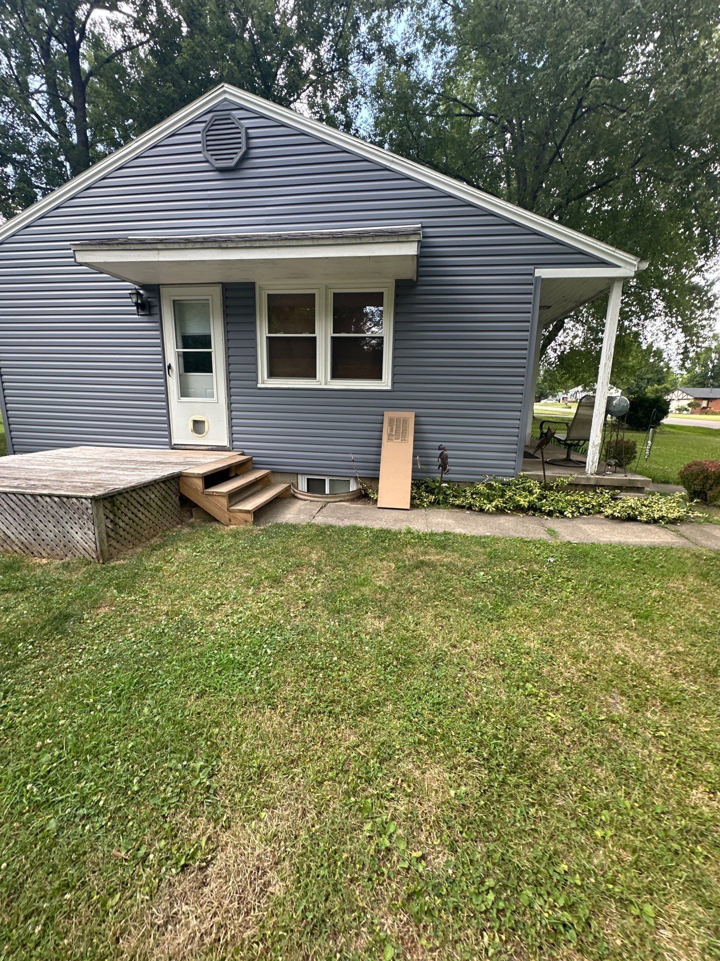 A new shutter set out by the back window, Beavercreek, Ohio.