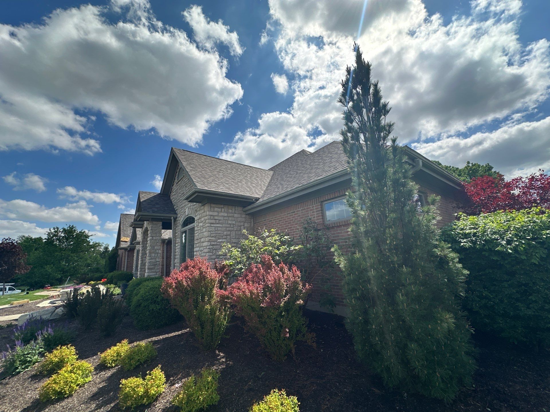 Stone gable and planted border