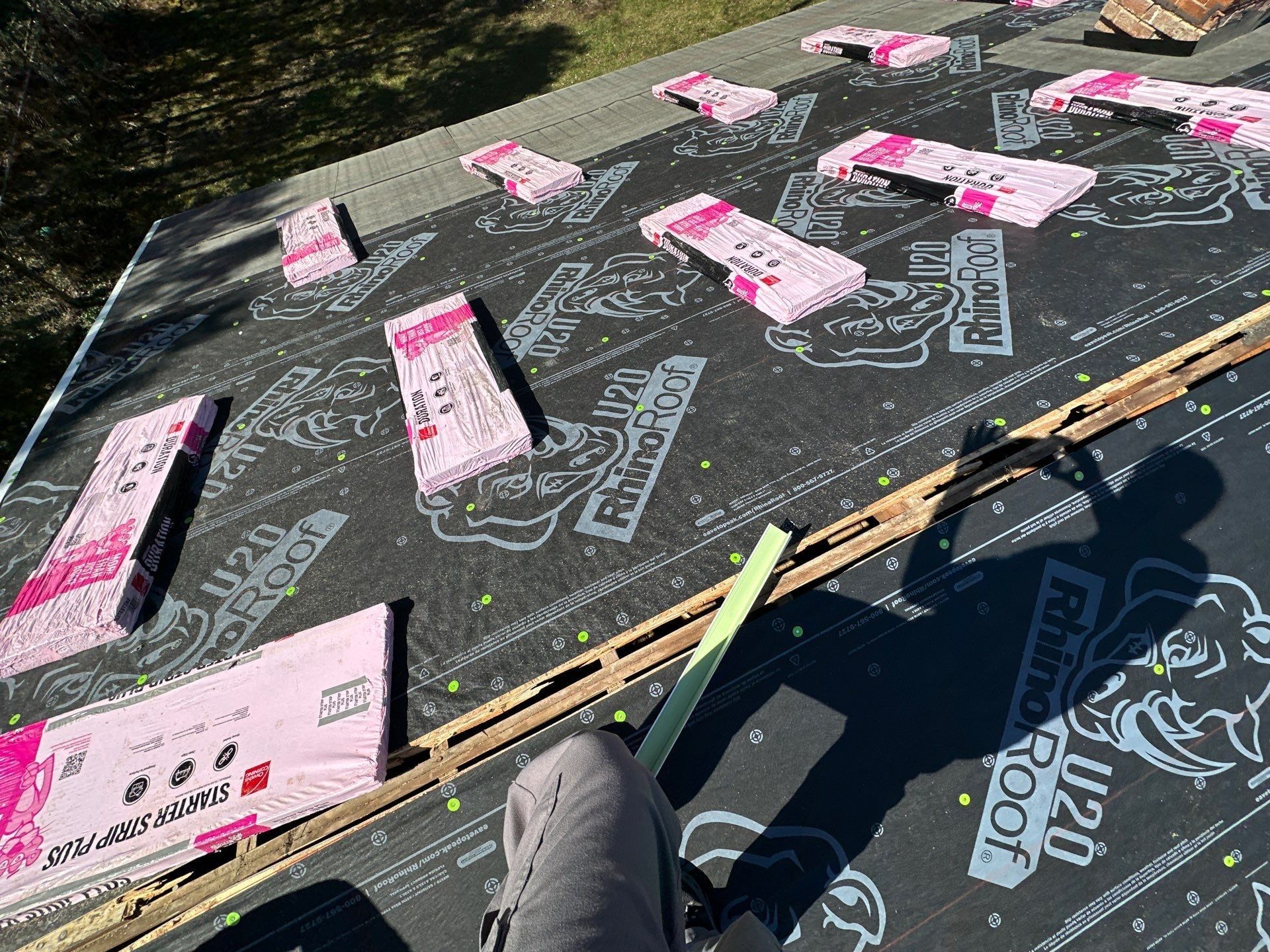 Bundles staged above the starter strip on the underlayment, Beavercreek, Ohio.