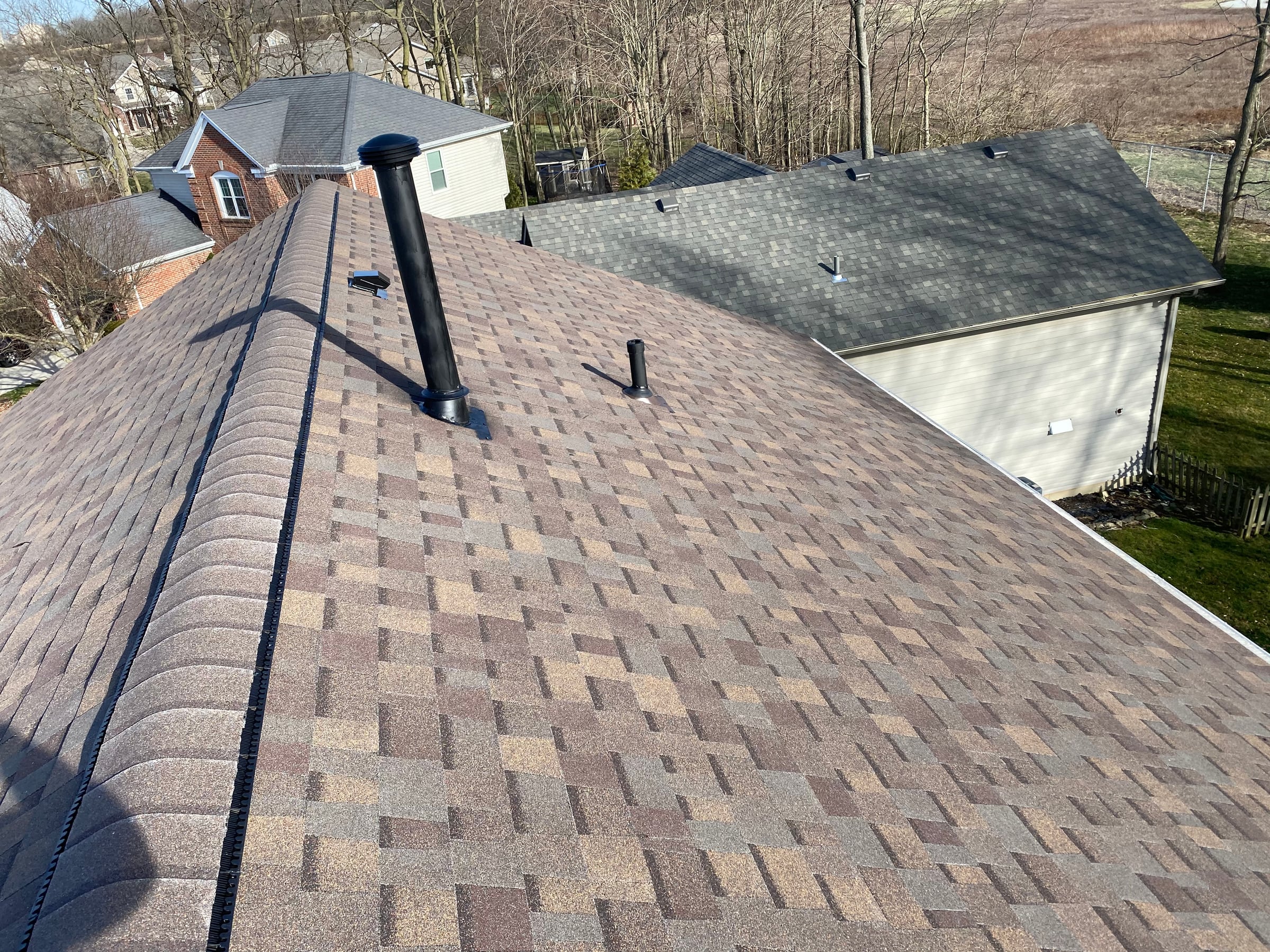 Plane, two vent stacks and ridge vent