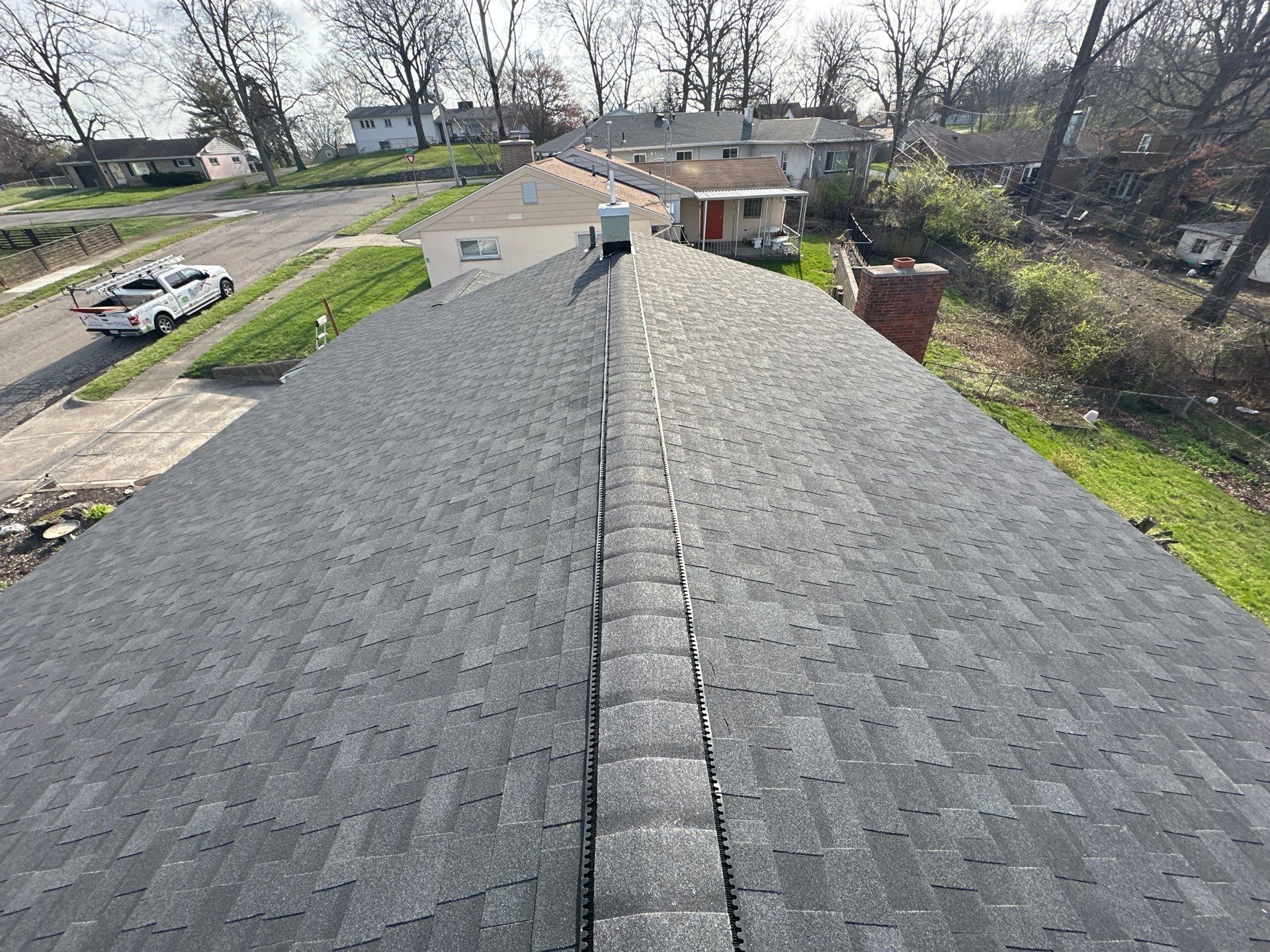 The finished ridge vent running toward the back yard, Dayton, Ohio.
