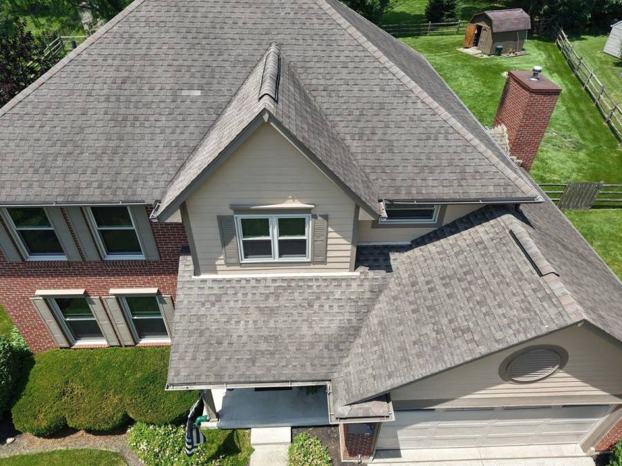 Drone photo of weathered shingles on the old roof, including an area repaired earlier, Beavercreek, Ohio.