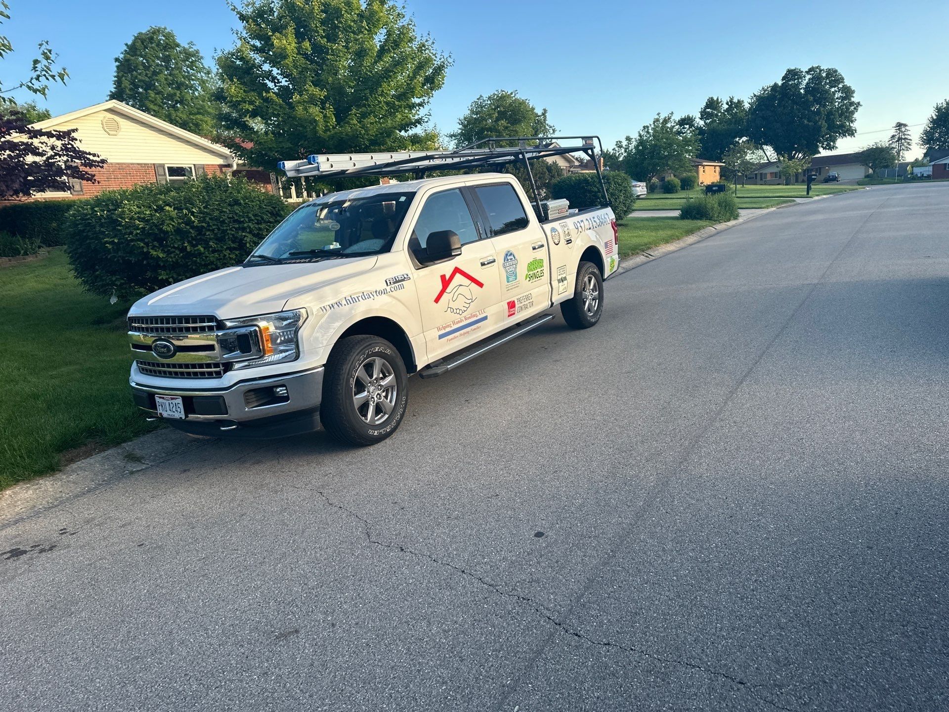 The work truck parked at the curb on install day, Beavercreek, Ohio.