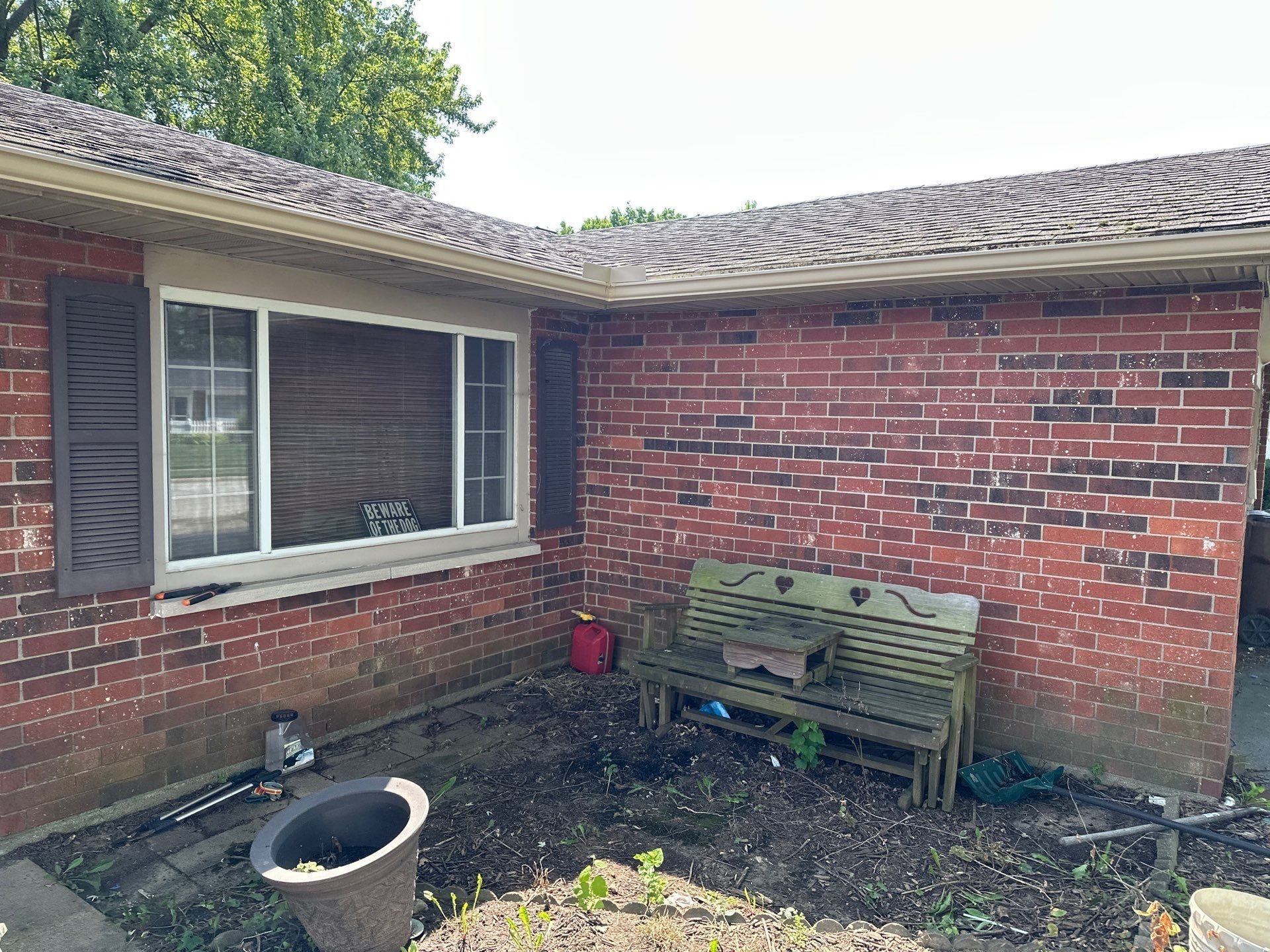 New gutters meeting at the inside corner by the front bench, Xenia, Ohio.