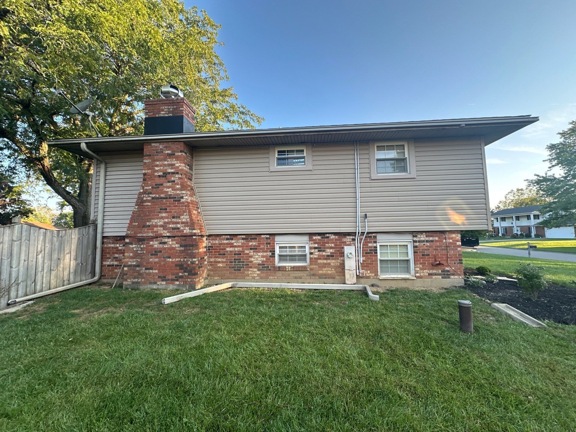 New siding on the chimney side of the house, Beavercreek, Ohio.