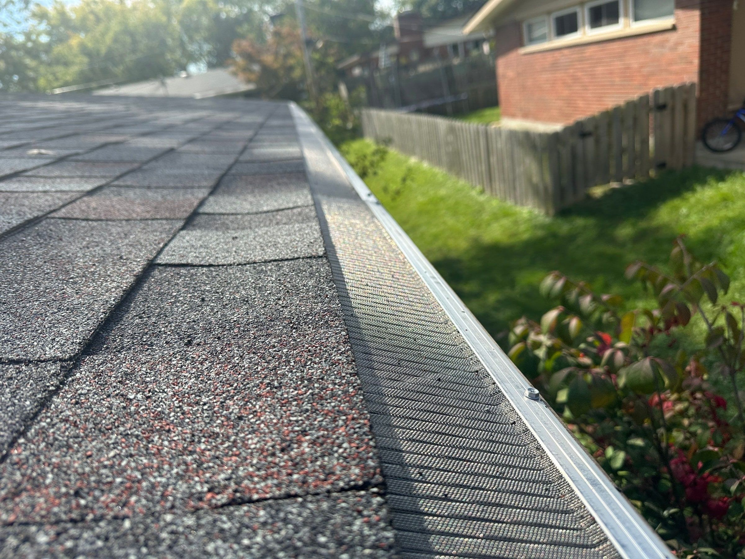Stainless steel mesh gutter guard along the eave on Brubaker Dr, Kettering