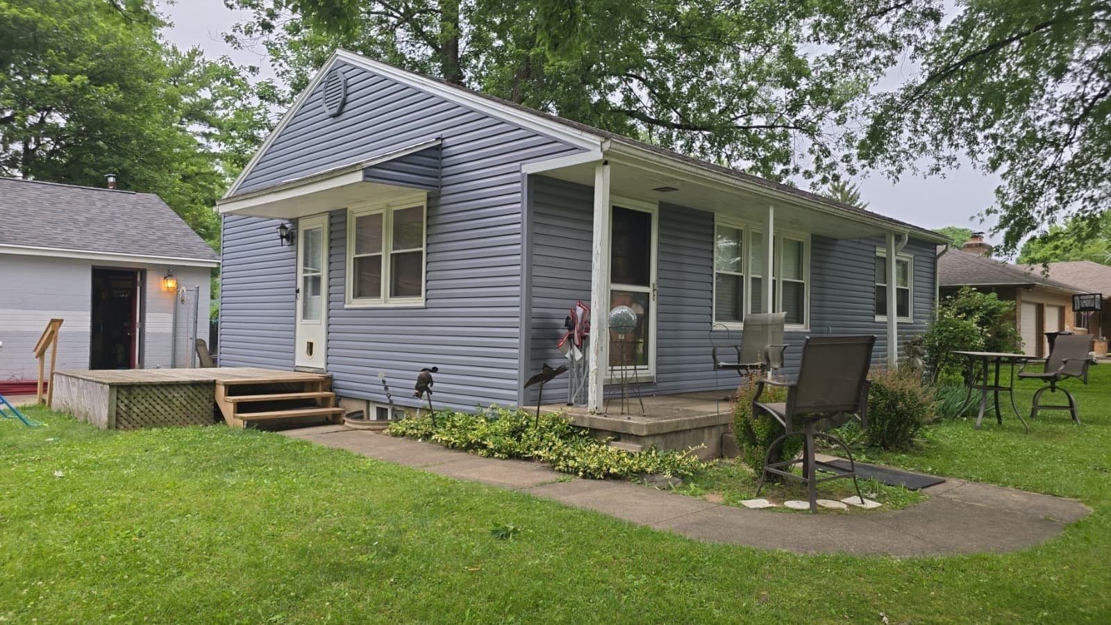 The completed exterior of a Beavercreek, Ohio home after Helping Hands Roofing replaced the siding.