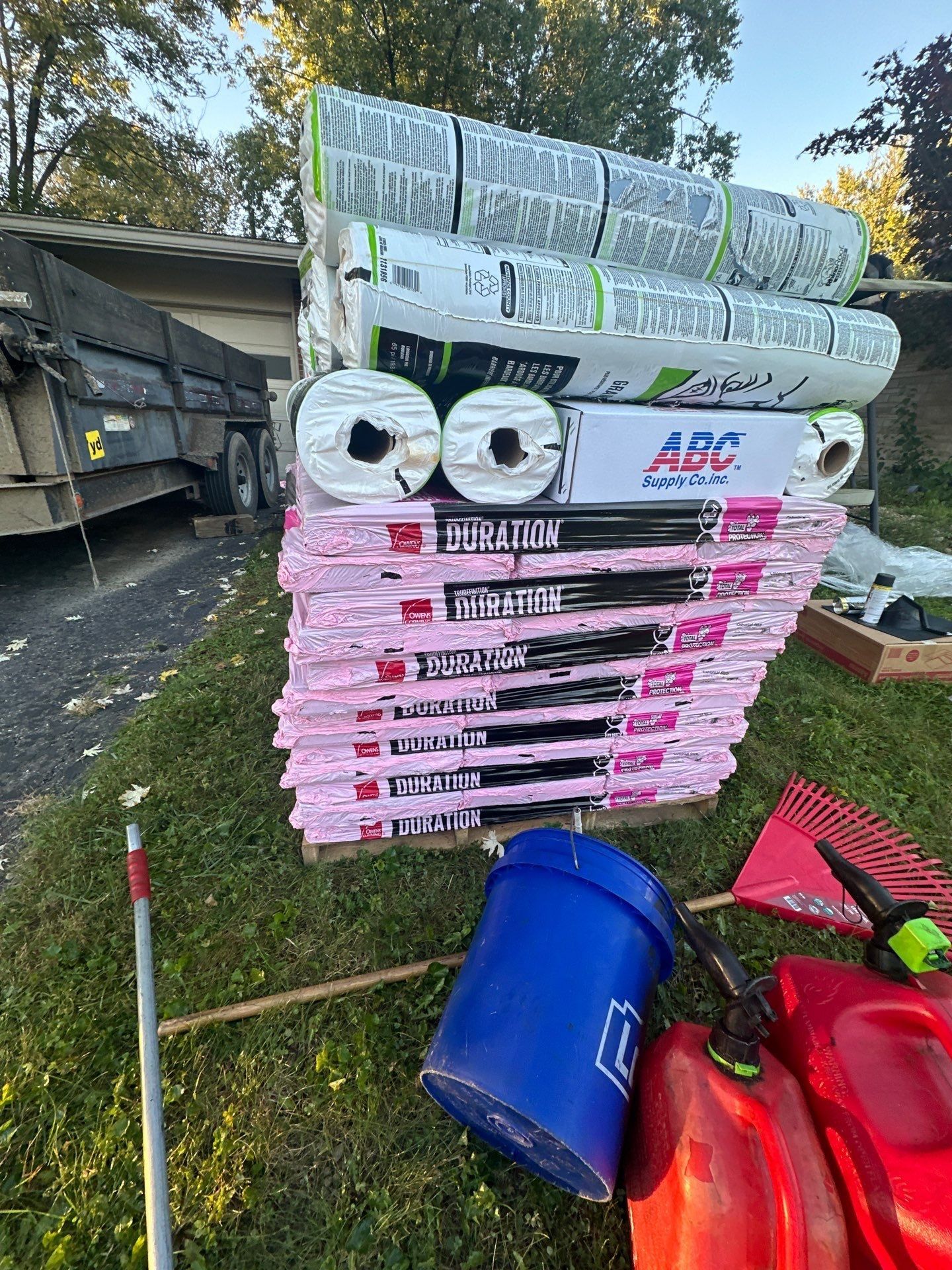 Owens Corning Duration bundles and underlayment rolls on the lawn, Kettering, Ohio.
