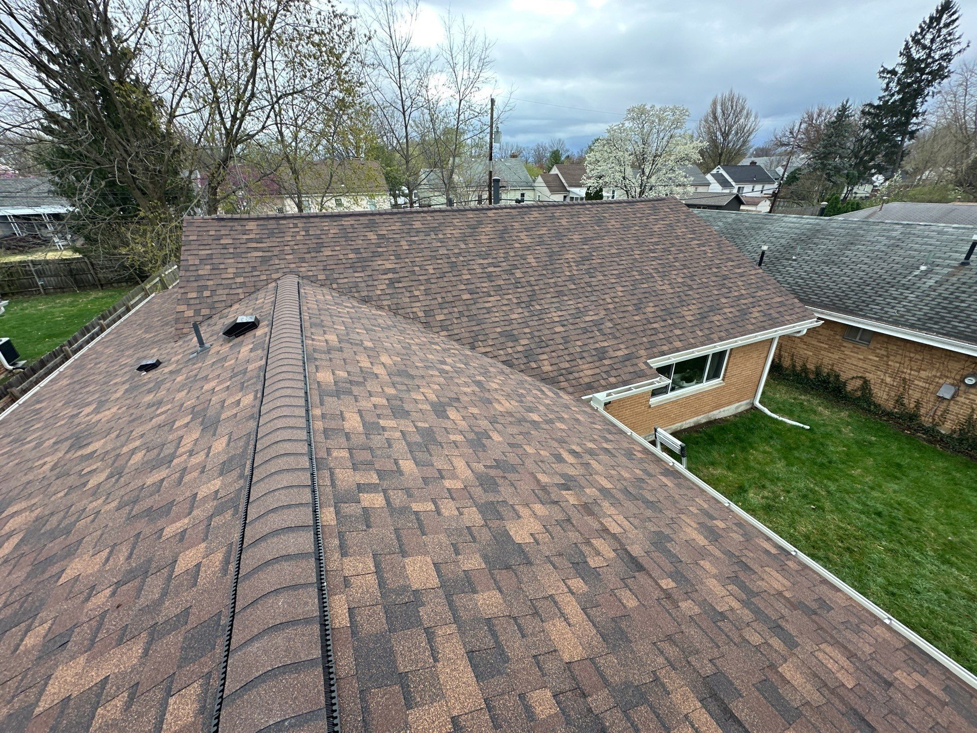 The finished ridge and vents above the back yard, Dayton, Ohio.