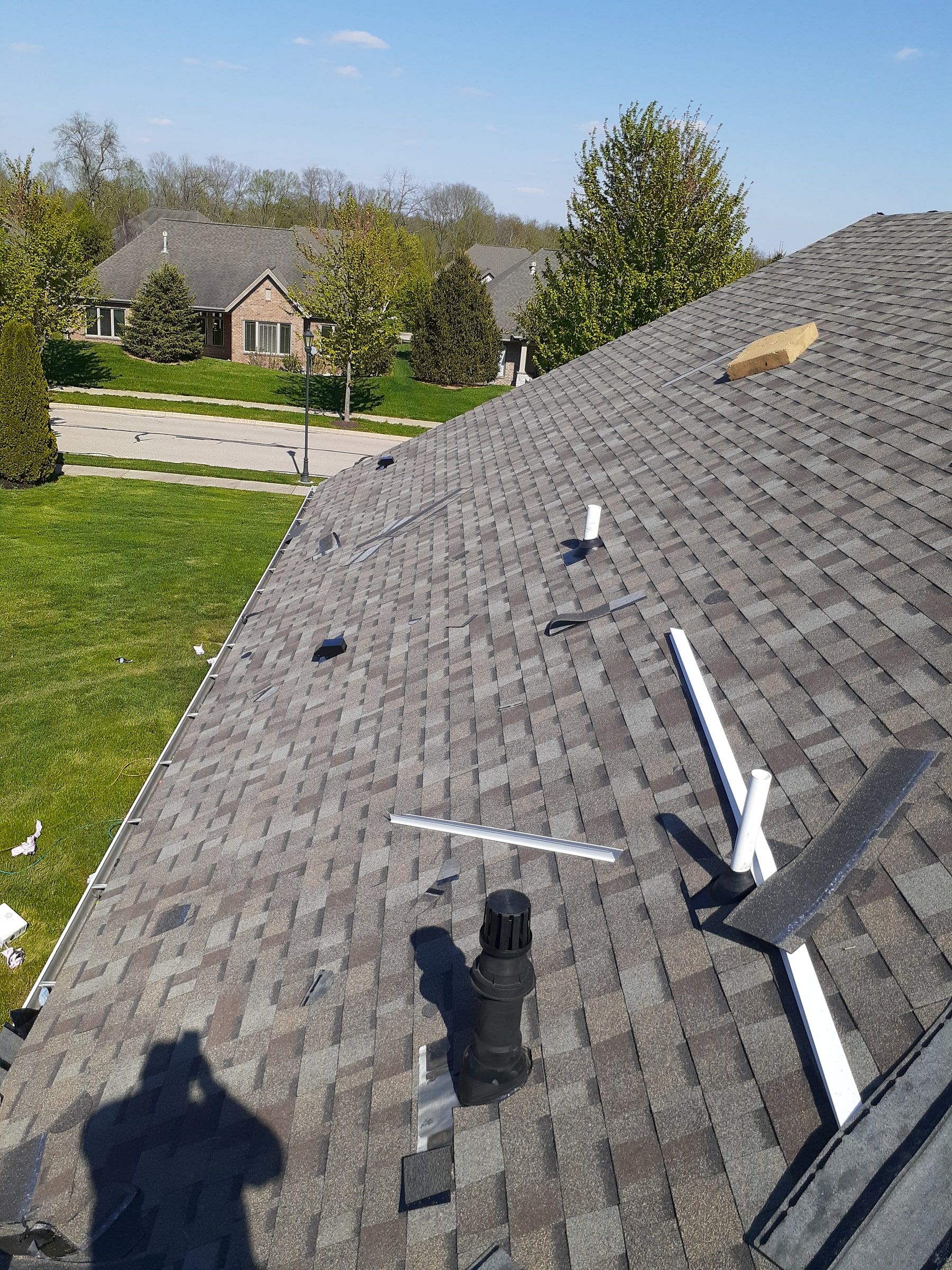 New Duration shingles going on around a vent pipe, Xenia, Ohio.