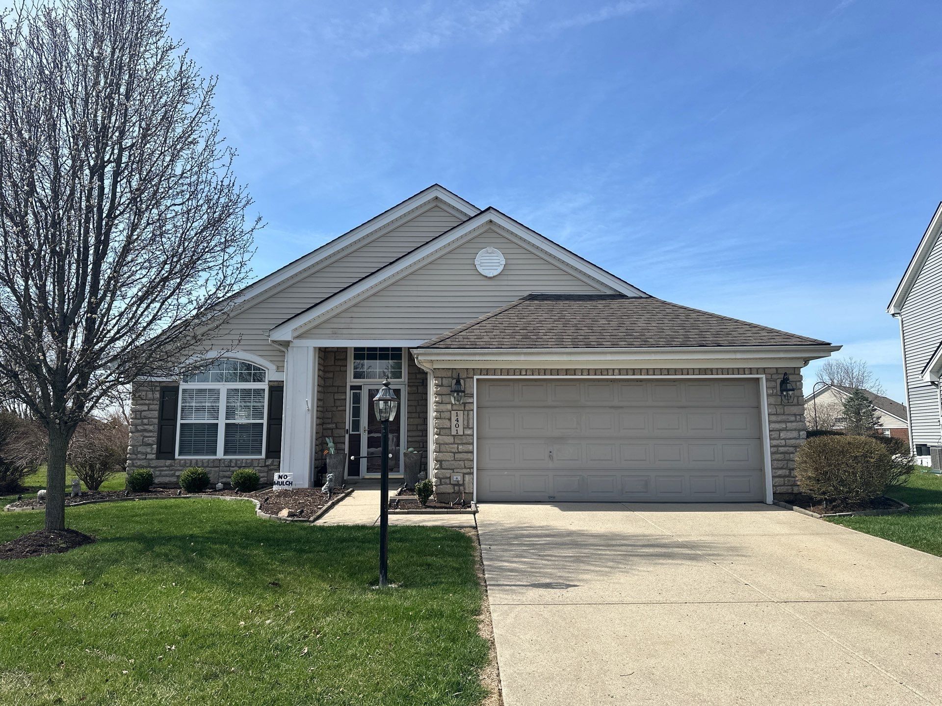 Brick ranch from the driveway
