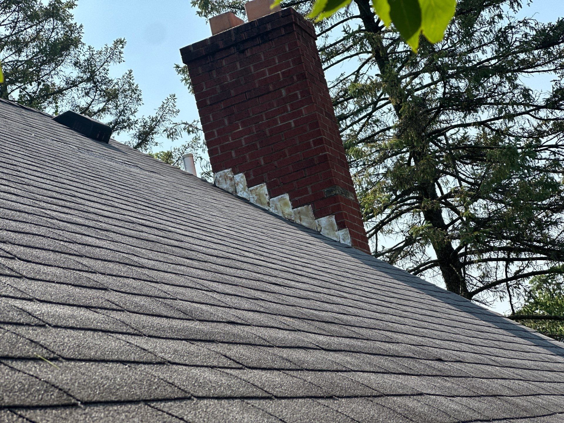 The old roof running up to the brick chimney, Beavercreek, Ohio.