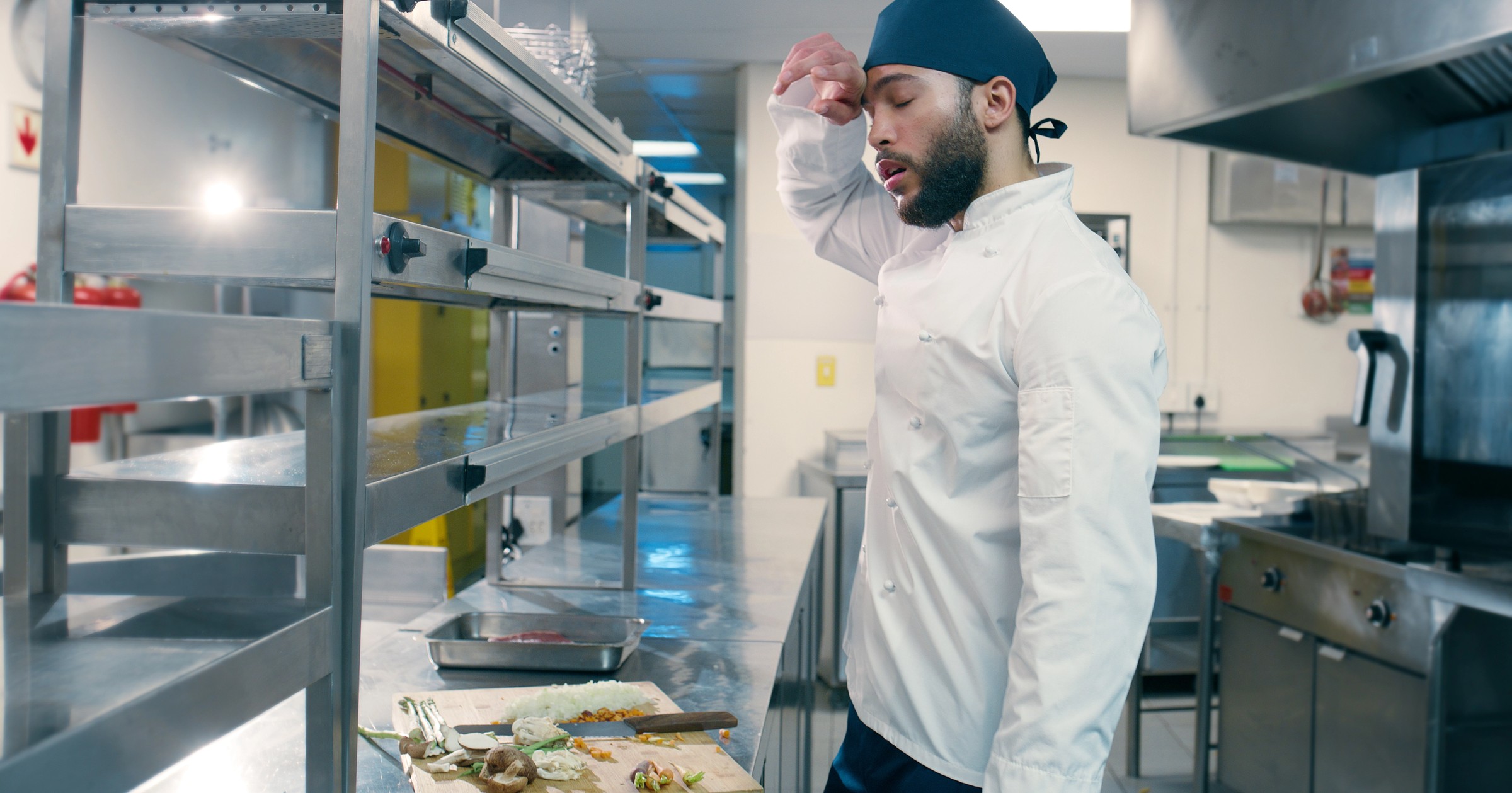 Cafe customer paying for their beverage with a credit card