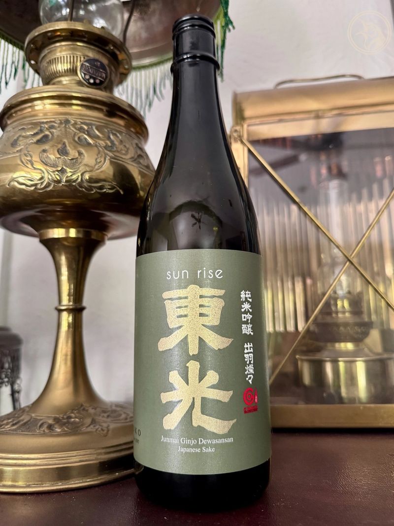 Toko Sun Rise—Junmai Ginjo Dewasansan—Kojima Sohonten Toko Sun Rise Junmai Ginjo bottle by Kojima Sohonten