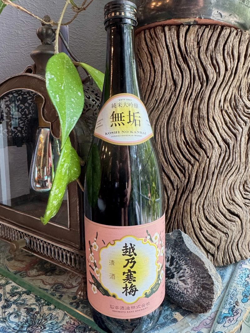 Koshi No Kanbai “Muku” Pure Realm — Ishimoto Sake Brewery Ishimoto Sake Brewery’s Koshi No Kanbai Muka Pure Realm sake bottle