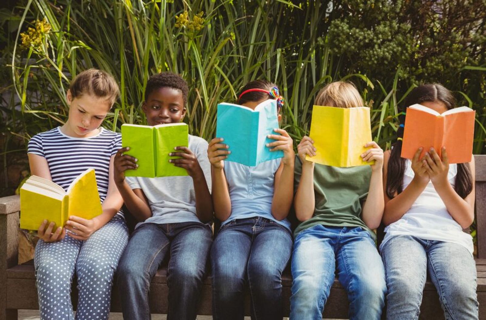 Five children reading books
