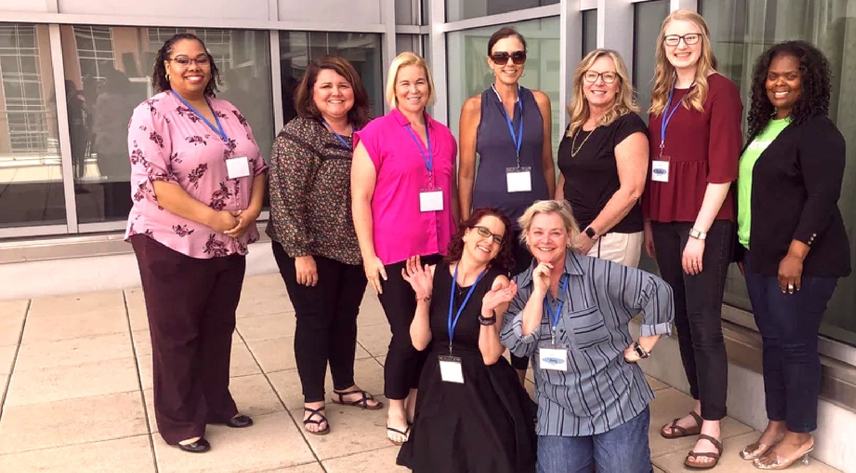 A group photo of Bridgeway team members smiling together.