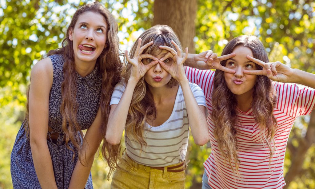 Three friends making faces at the camera