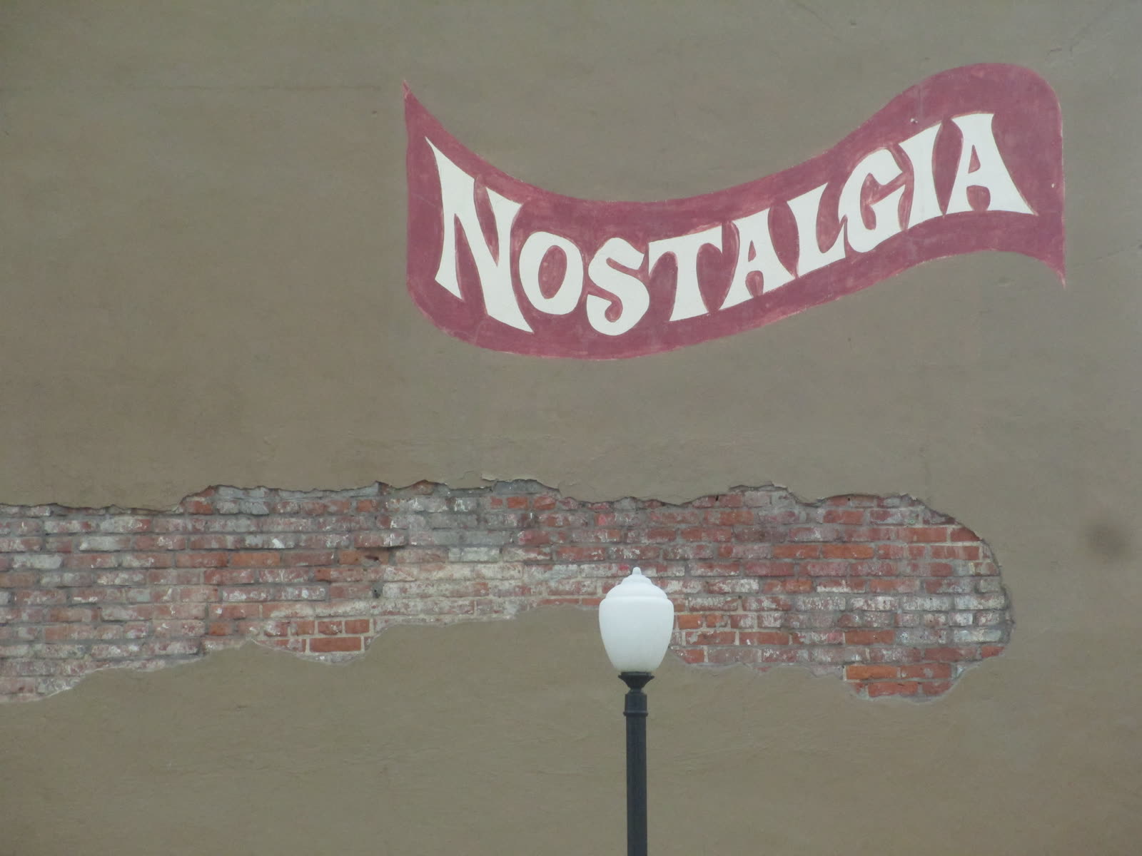 Nostalgia Antiques & Soda Fountain logo