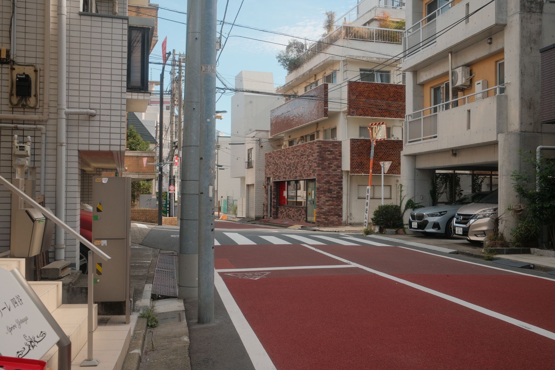 Quiet residential street in Shinjuku, Tokyo, the kind of neighborhood where minpaku short-term rentals face the tightest rules.