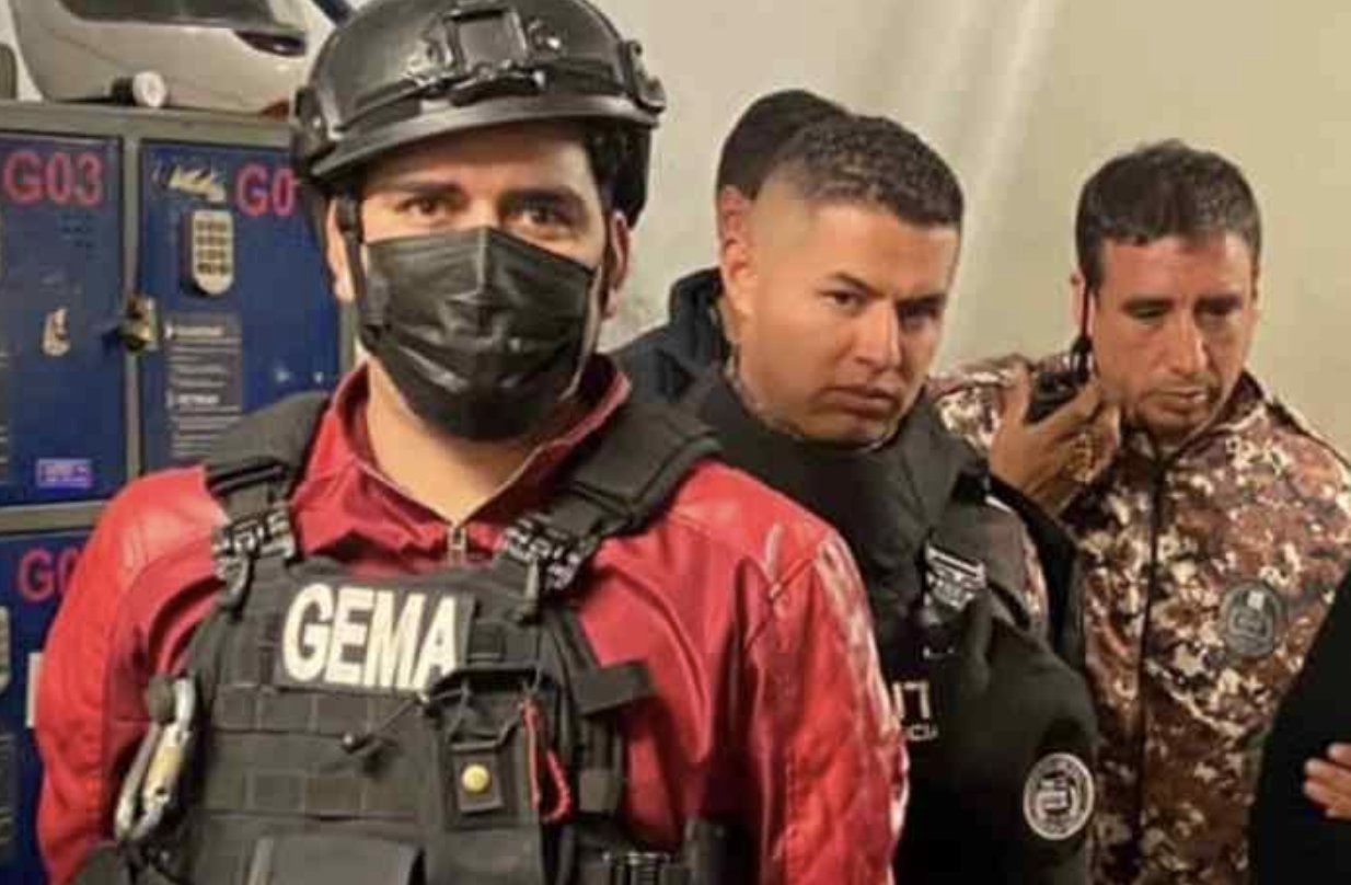 Leandro Norero (left) entering the Cotopaxi Detention Center