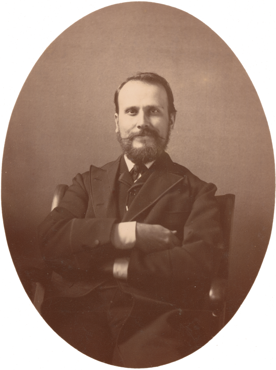 An oval studio portrait of Rudolf Blaschka, with a beard and dark suit.