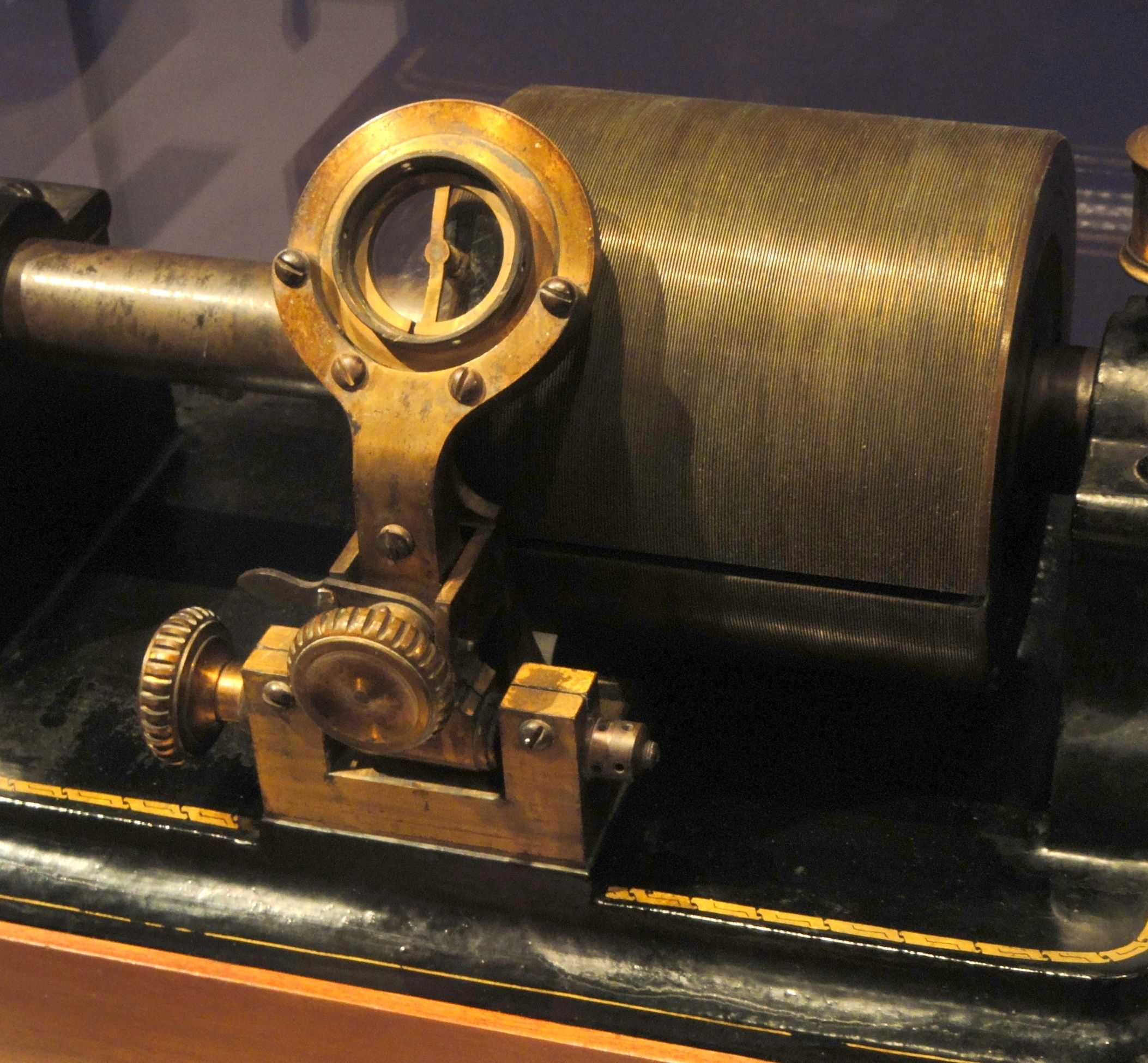 The grooved cylinder and adjustable diaphragm mounting of an 1878 tinfoil phonograph