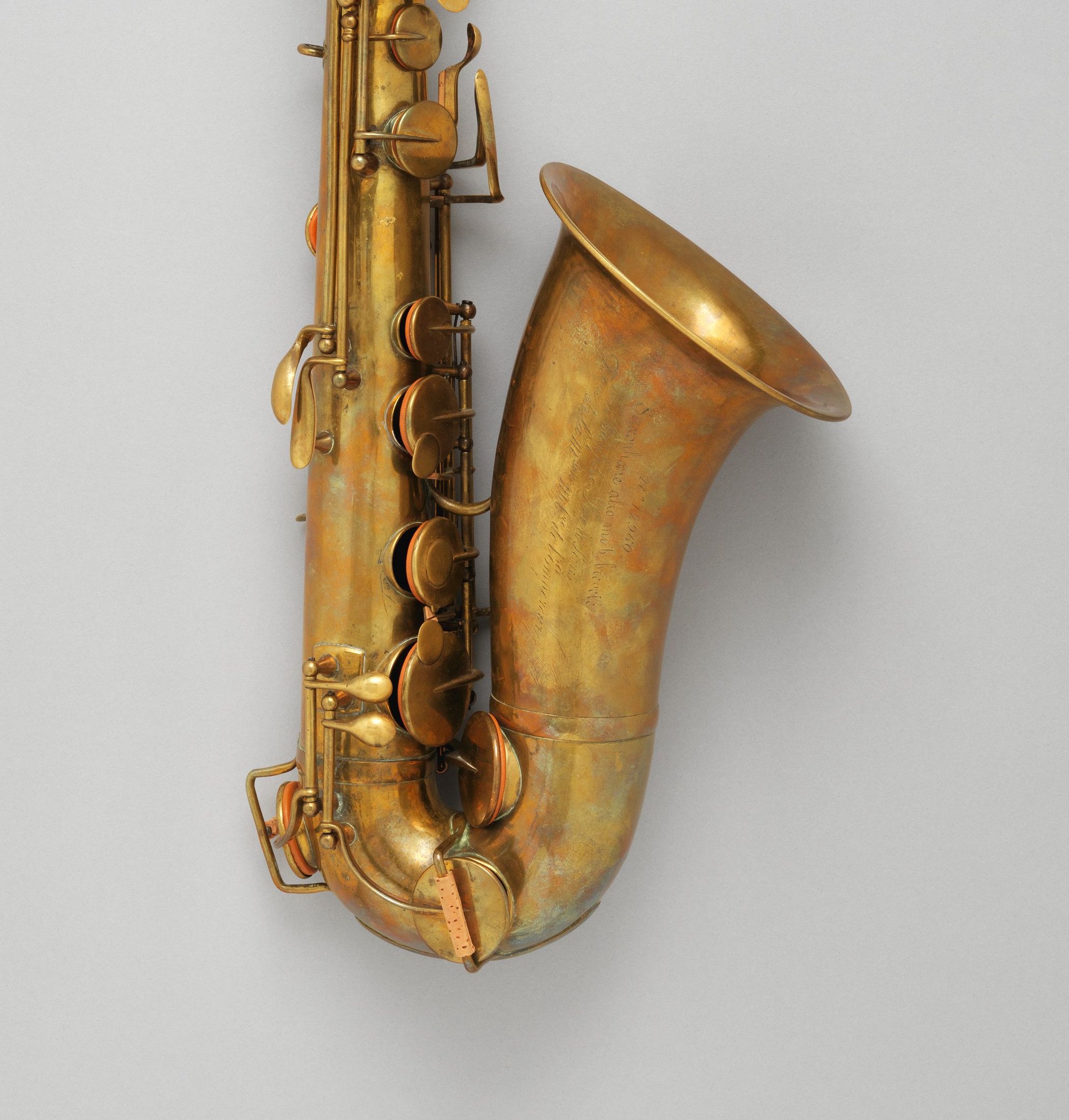 The keys, lower bend and bell of an early Sax alto saxophone