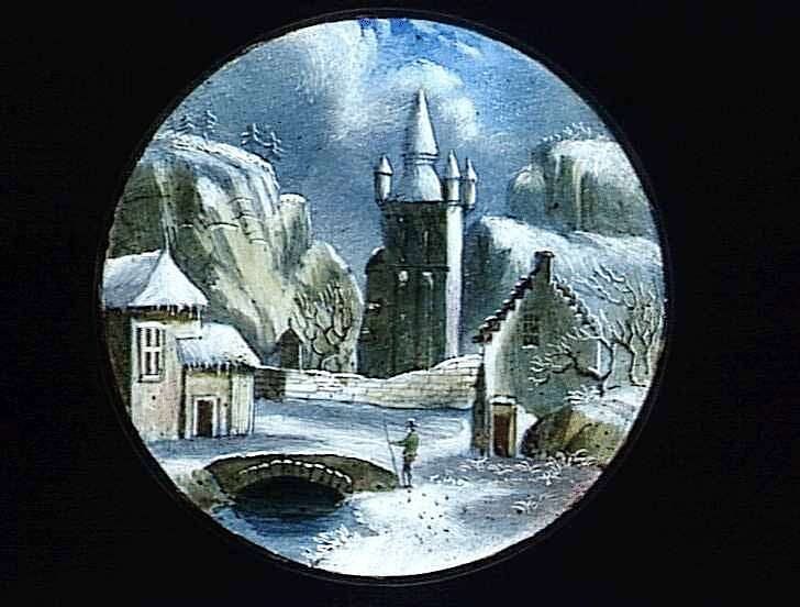 The same bridge, tower and buildings appear under snow, with bare trees and a figure in the foreground.