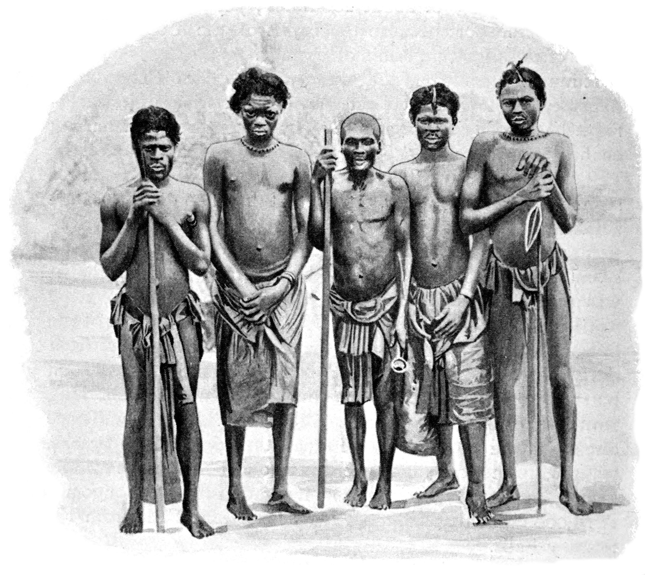 Five Adooma men of the upper Ogooué posed together in wrapped cloths and necklaces