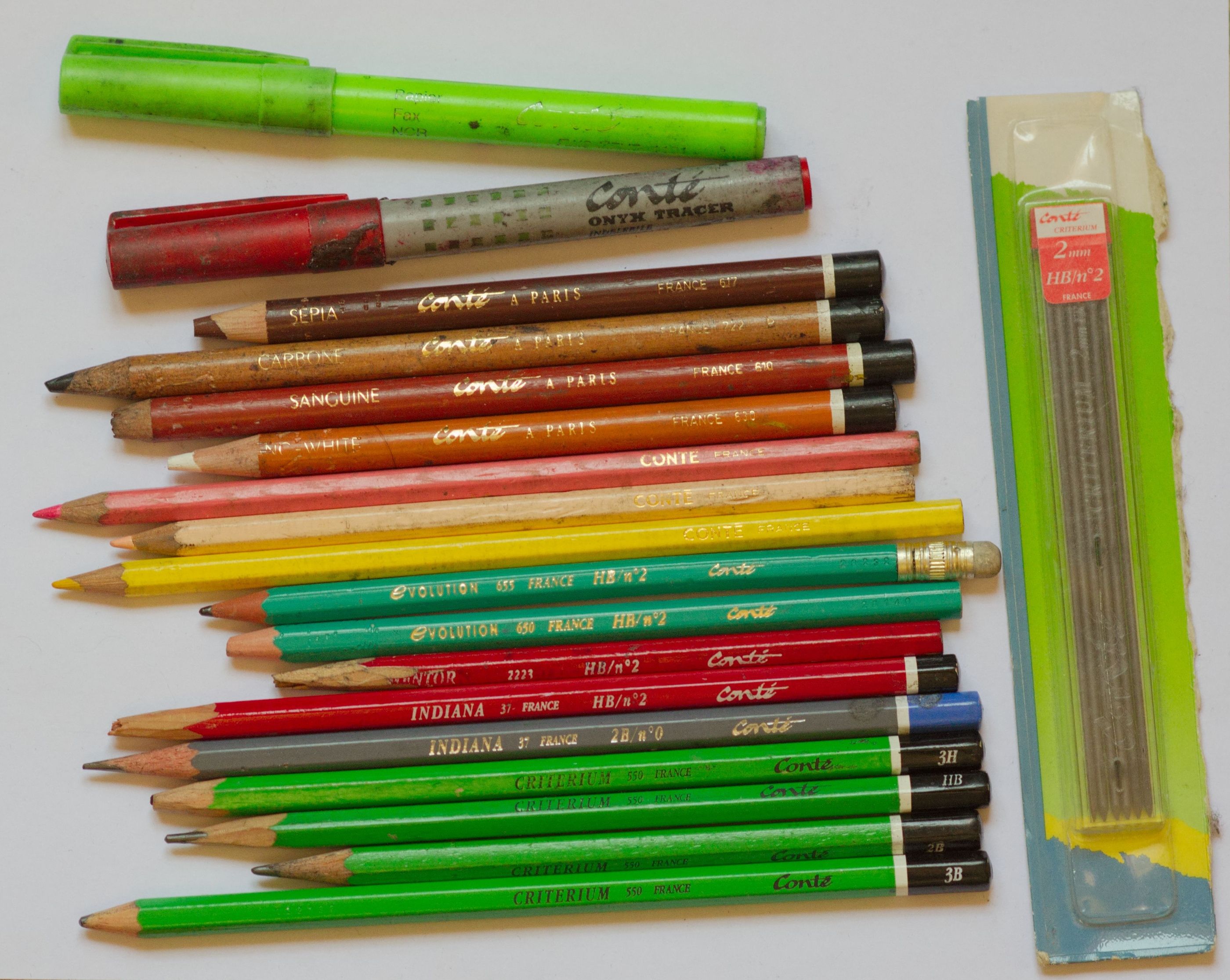 A collection of modern Conté and Criterium pencils, drawing materials and replacement leads