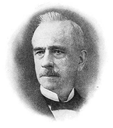 William K. Jenne in a portrait, wearing a dark suit and bow tie
