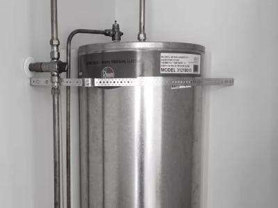 Stainless mains-pressure hot water cylinder installed by a plumbing subcontractor