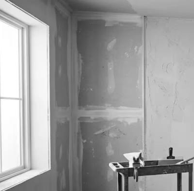 Half-finished drywall in a domestic room — gibbing subcontractor case study