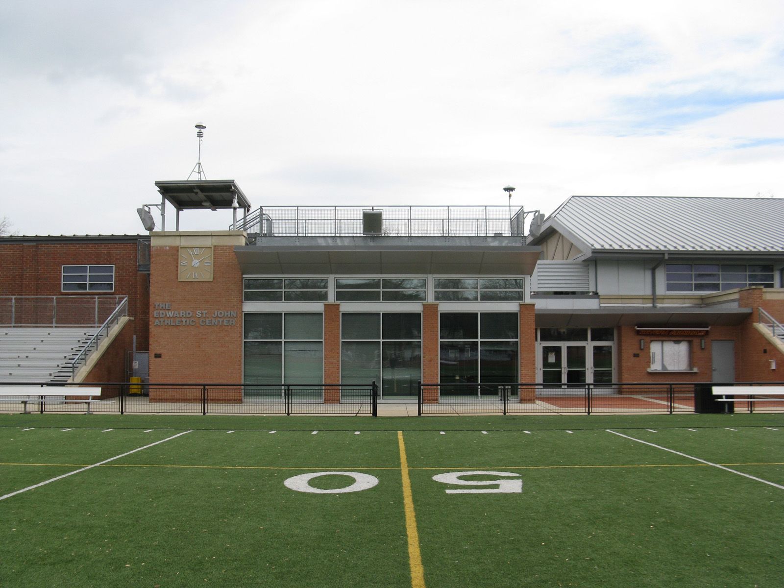School building with crows nest above and installed speakers