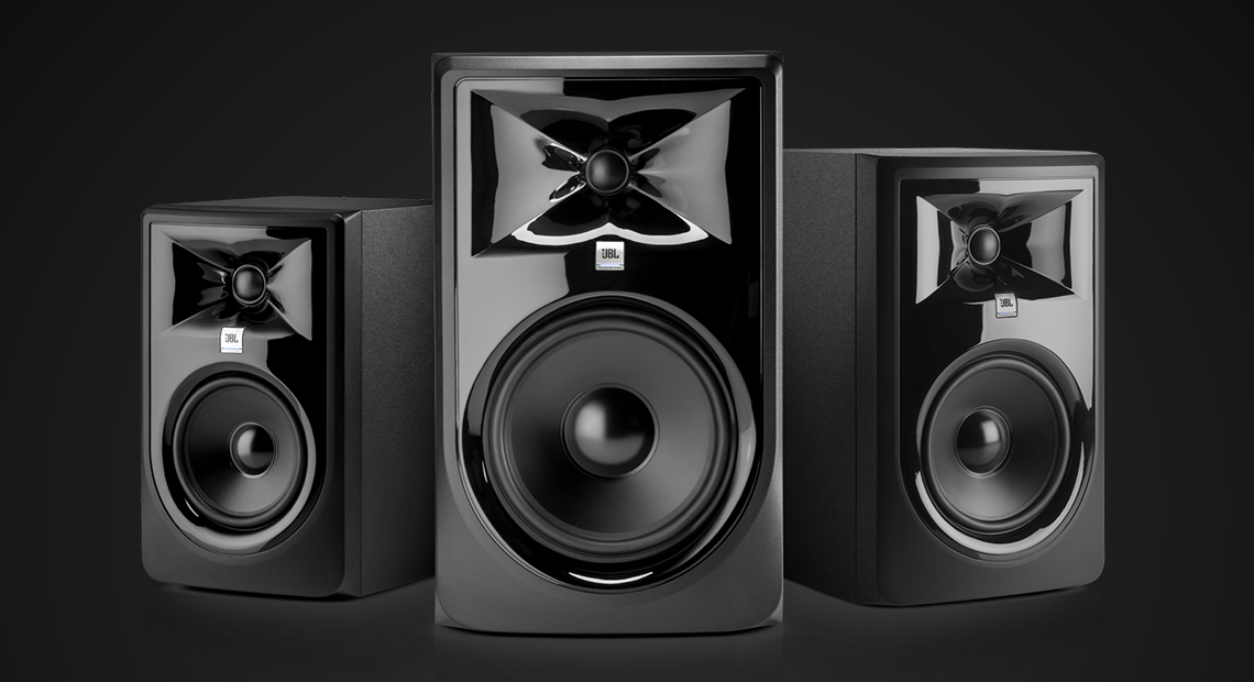 Three JBL 3 Series monitor speakers lined up