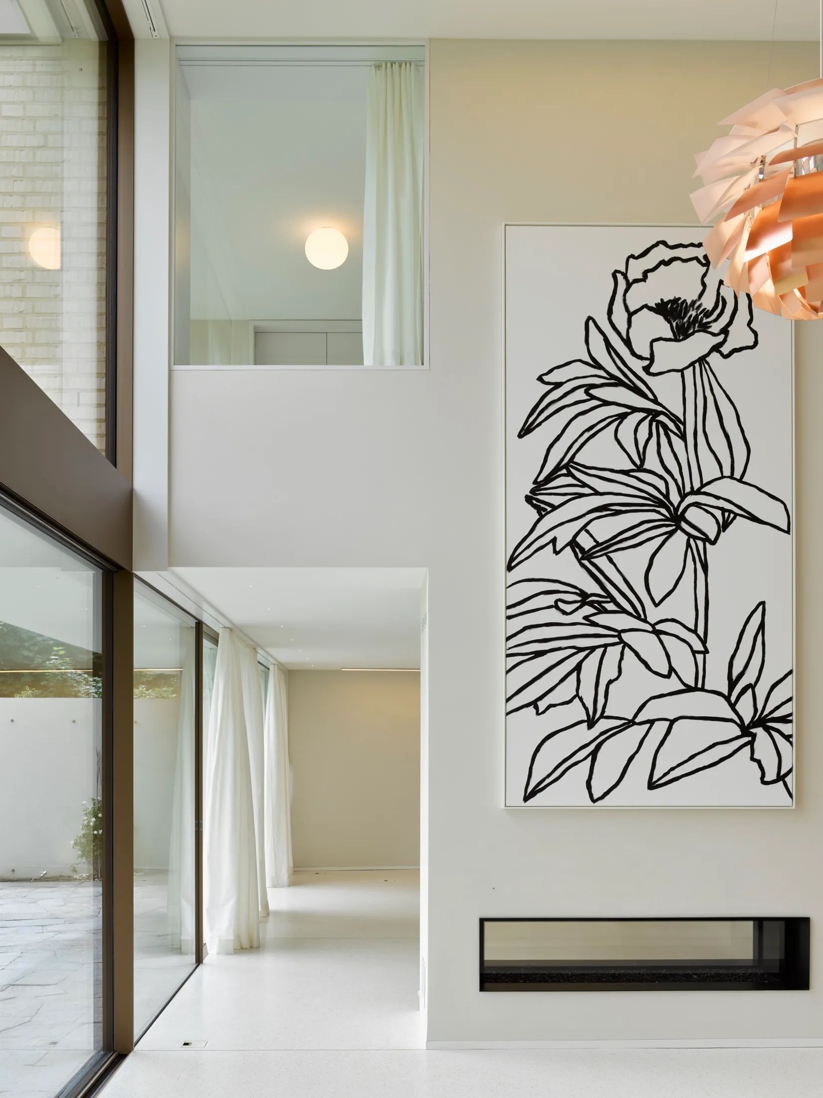 Innenansicht Wohnbereich mit Luftraum Villa Muri in Bern