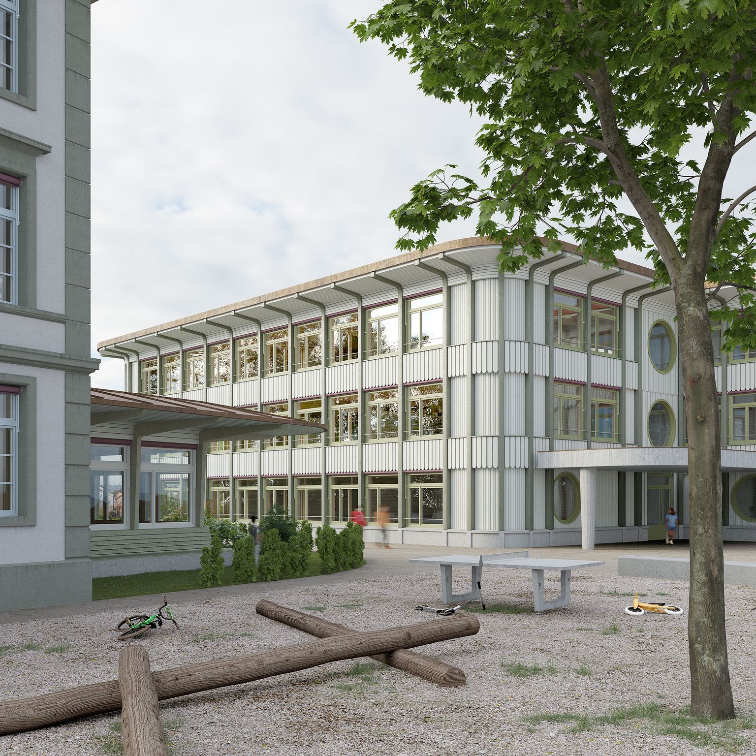 Schulhaus Paul Klee Münchenbuchsee Pausenplatz mit Sicht zum Eingangsbereich