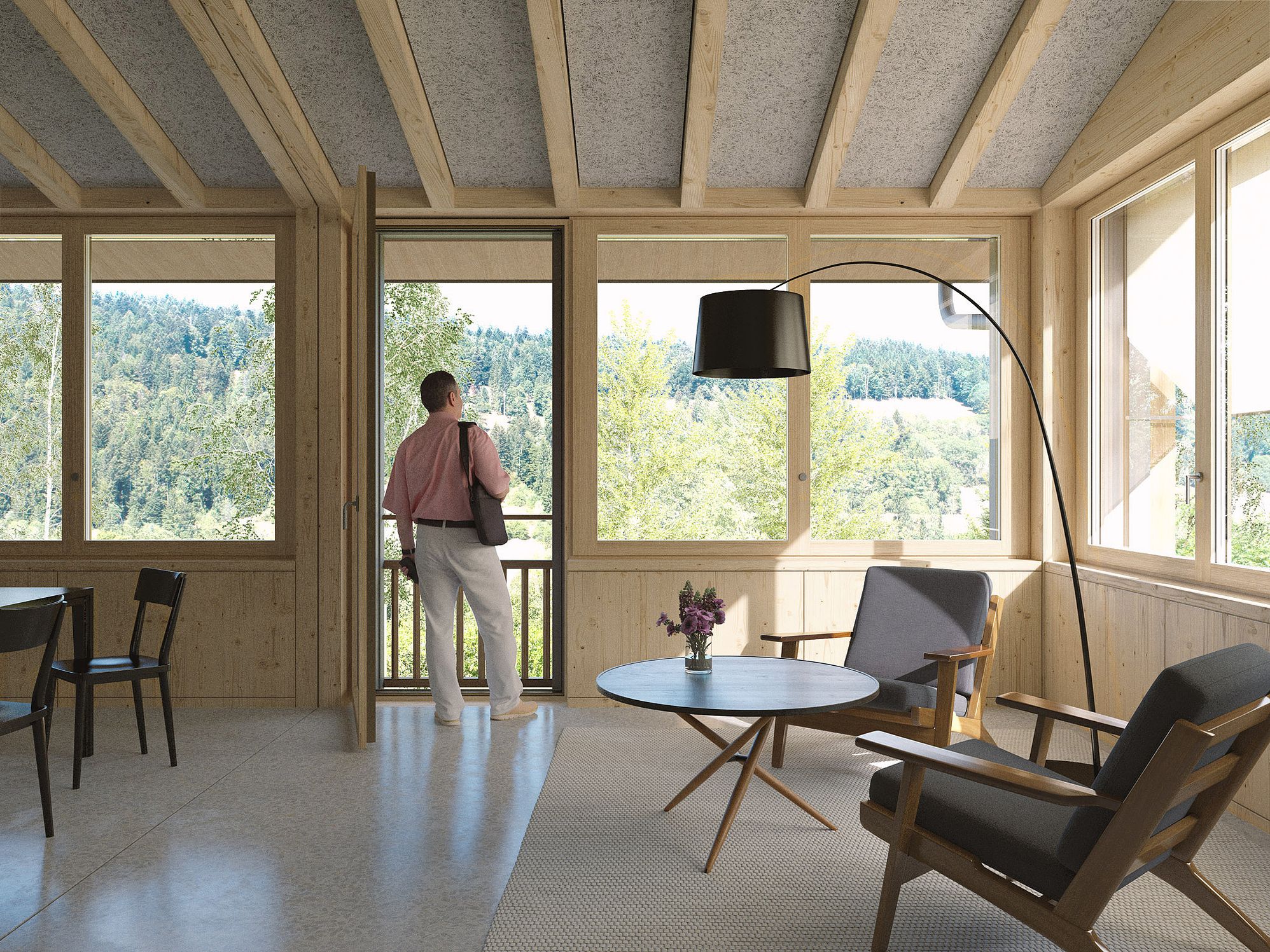 Wohnlicher Aufenthaltsraum mit deboskoop Holztisch, Horgen-Glarus-Stühlen, Ess-Tee-Tisch und Stehleuchte im Werkstattgebäude in Renan