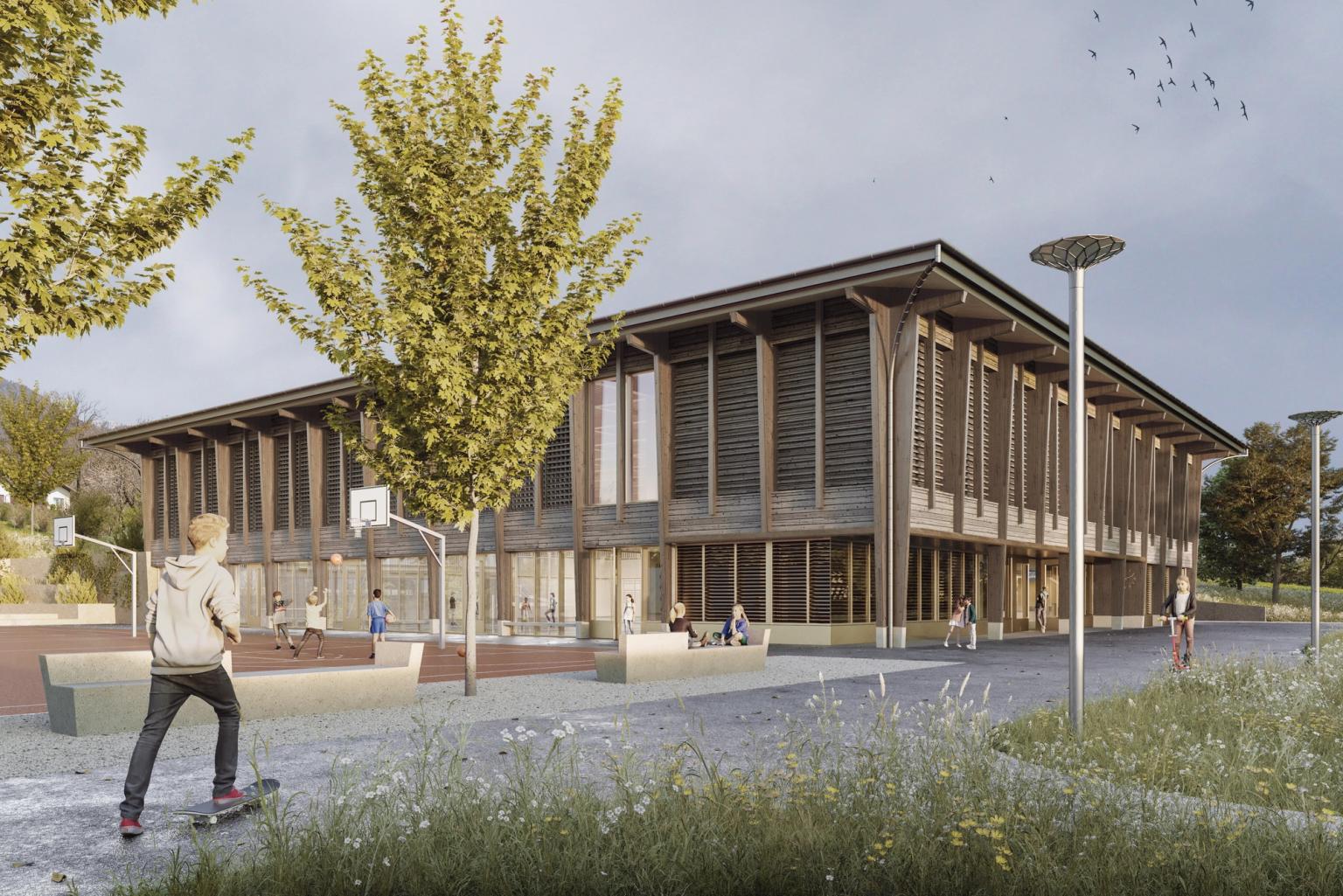Doppelsporthalle mit Holzfassade und Aussensportplatz beim Schulhaus Kastels in Grenchen