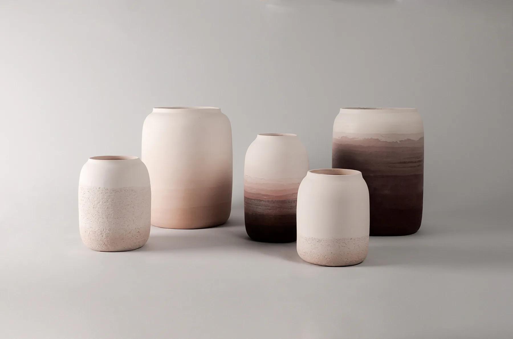 Nude ceramic collection showing layered unglazed clay surfaces