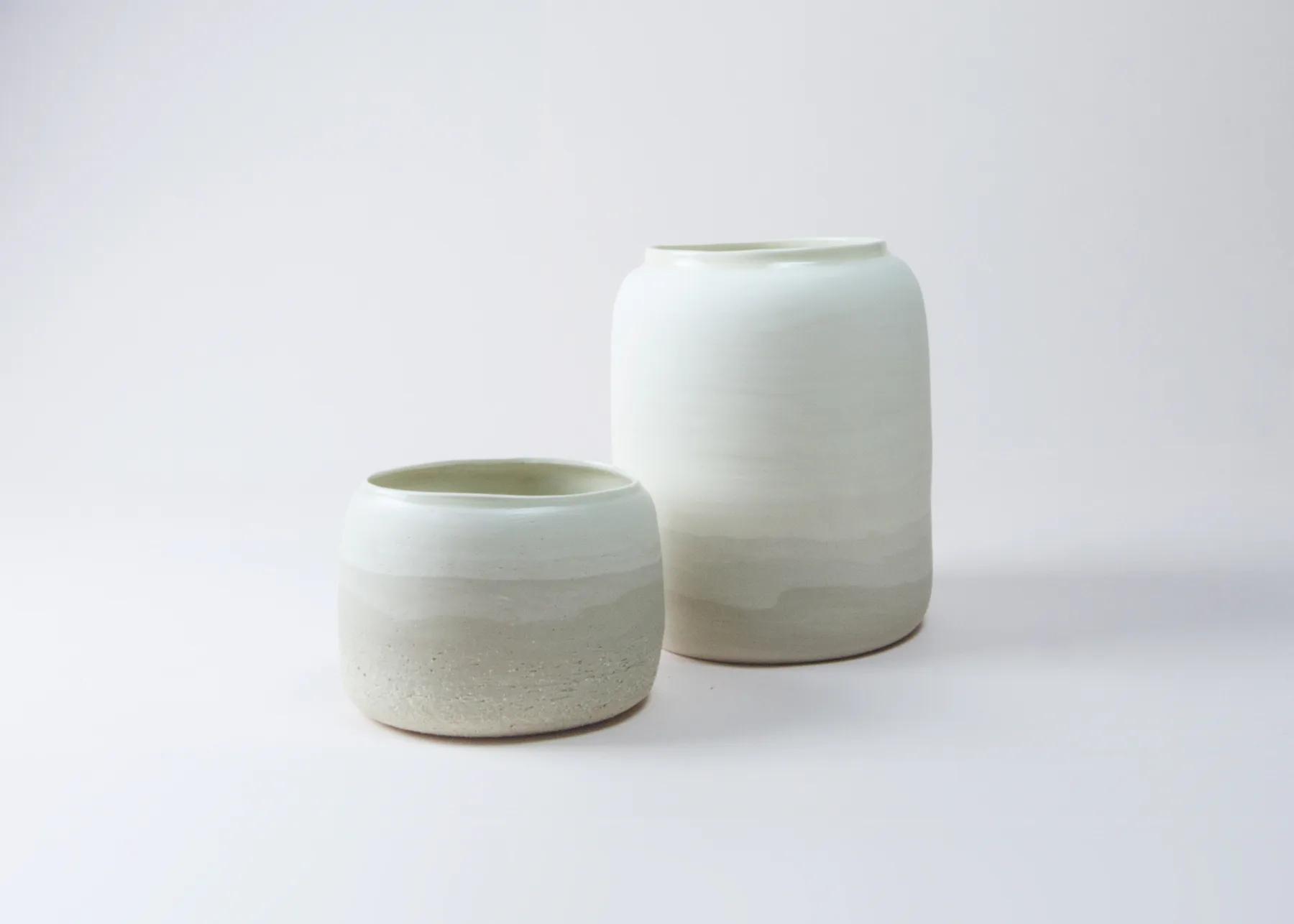 Two Nude vessels with graphic strata formed by contrasting clays