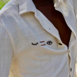 Origin Africa Embroidered Sawa Sawa Shirt made by SOKO Kenya Ethical Clothing Factory.