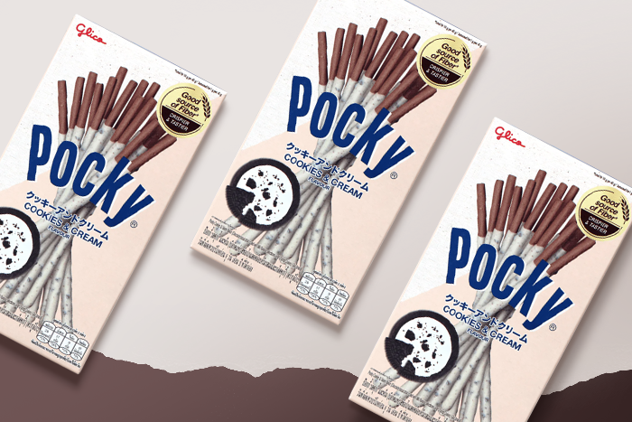 Ein Pocky Stick, umhüllt mit Cookies & Cream, detailreich präsentiert.