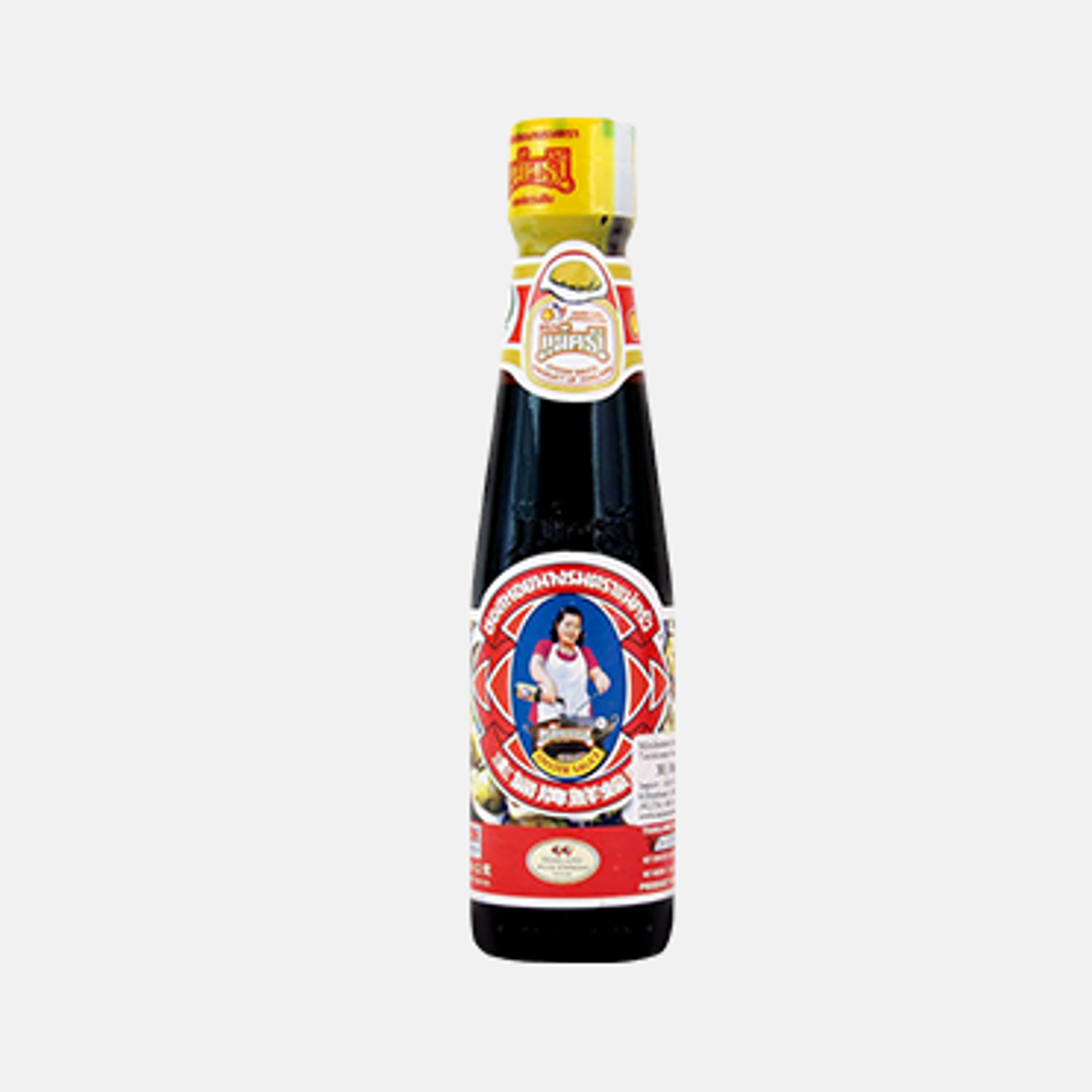 Eine Küchenanrichte mit einer Flasche MAEKRUA Oyster Sauce neben frischen Zutaten, bereit für die Zubereitung eines authentischen asiatischen Gerichts.