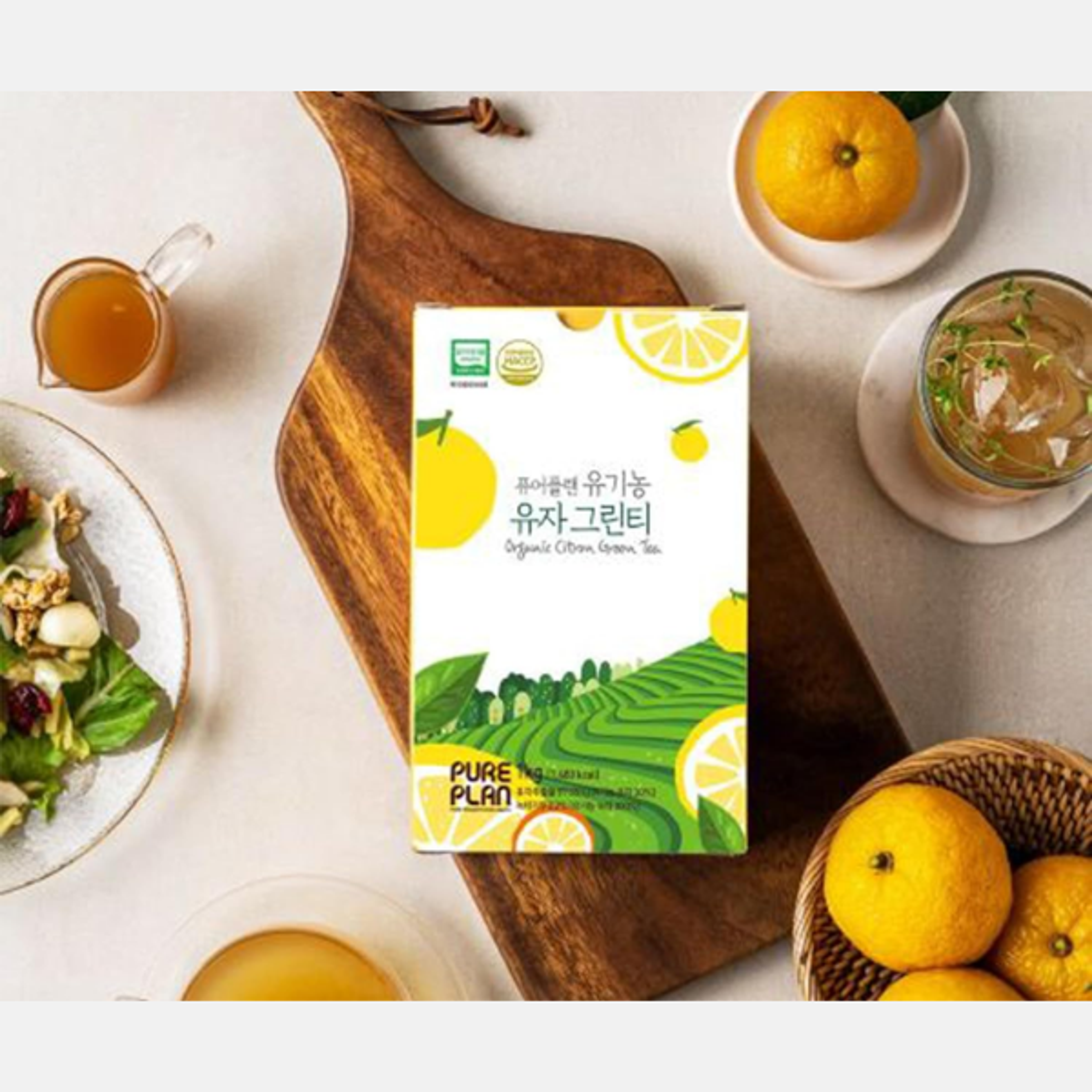 Vorderansicht der PurePlan Bio Yuzu & Green Tea Konzentrat 1kg Packung – zeigt das frische und nachhaltige Design.