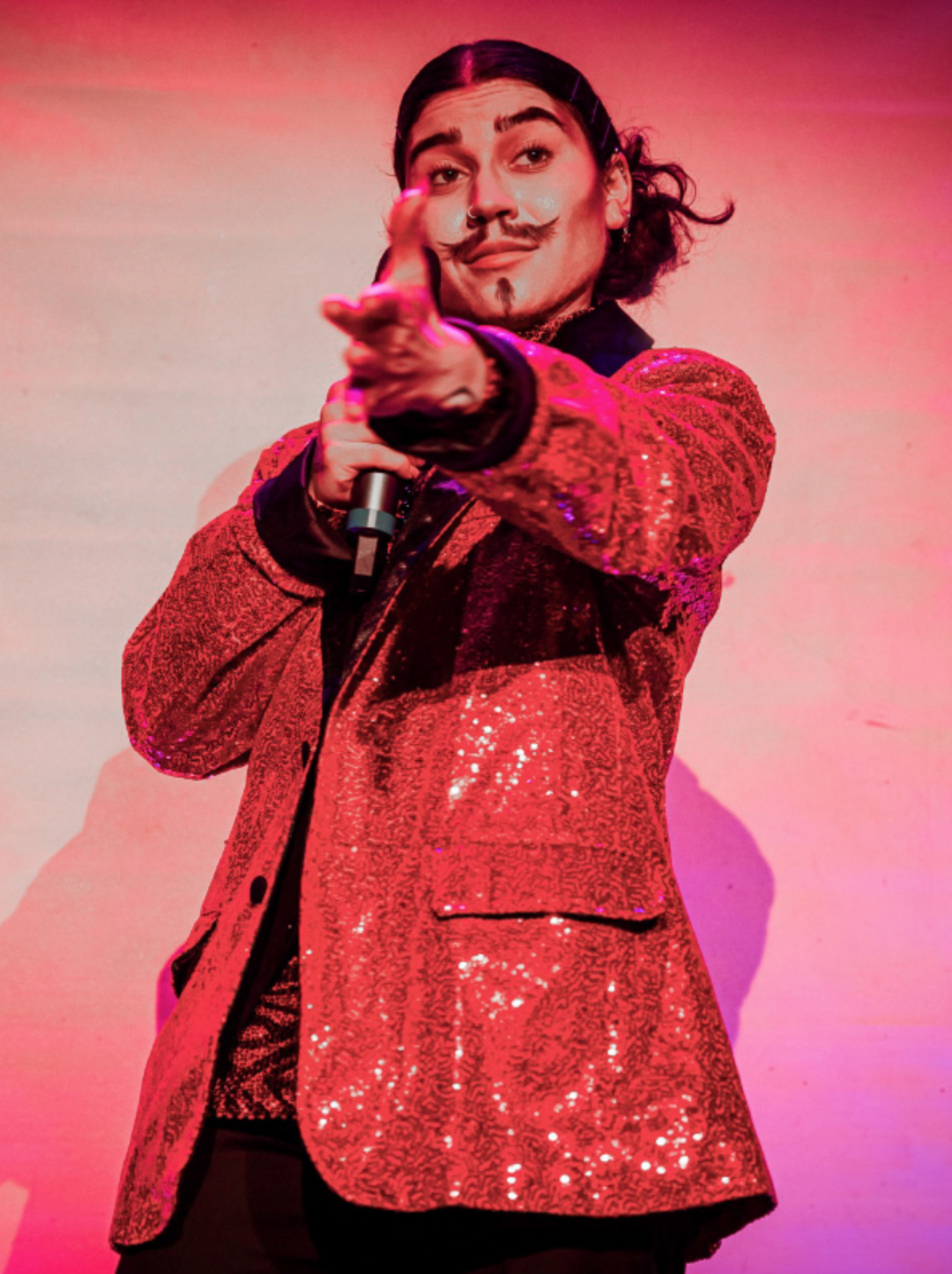 Angel deVille (Host)