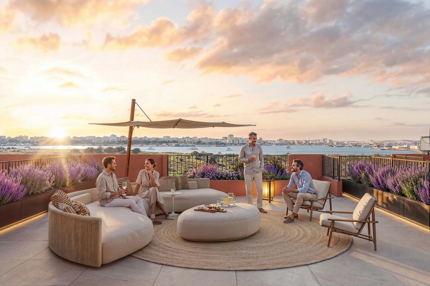 Friends gathered in a rooftop lounge at sunset, overlooking the Arade river and Portimão.